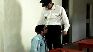 Horny and young twink inmate sucks the guard's big dick