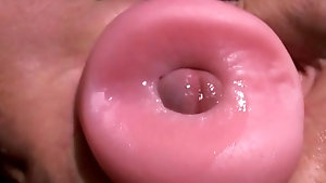 Dirty twink shoves his erect cock in pocket pussy POV