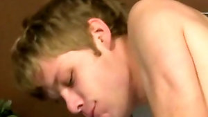 Beefy hunk is showing this sexy twink how to fuck
