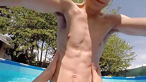 Twink enjoys tanning and fucking by a nice cold pool