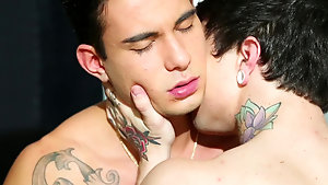 Sexy tattooed twinks are fucking each other in anal holes