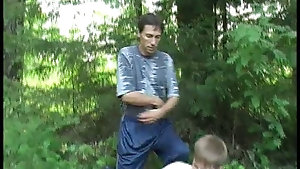 Pale twink undresses in forest and gets handjob from elder